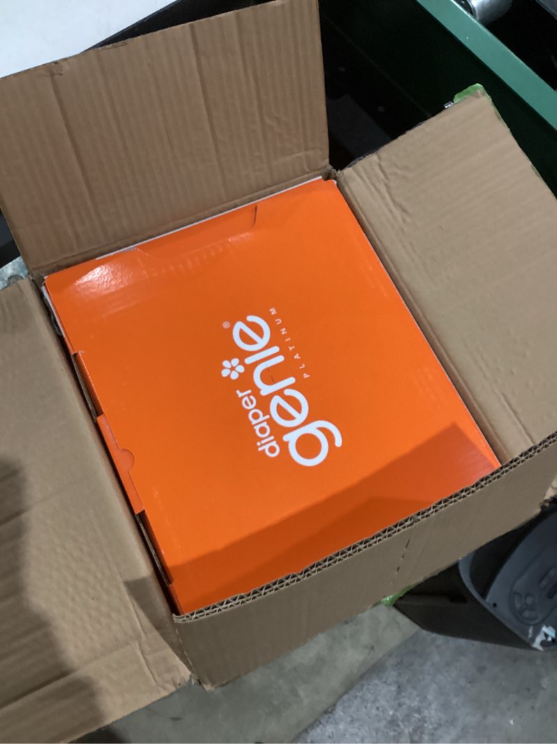 Condition photo showing As Is for Diaper Genie Platinum Pail (Lily White) is Made in Durable Stainless Steel and Includes 1 Easy Roll Refill with 18 Bags That can Last up to 5 Months.