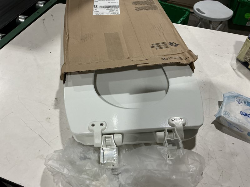 Condition photo showing As Is for bemis ashland elongated soft close enameled wood removes for easy cleaning, never loosenstoilet seat in white