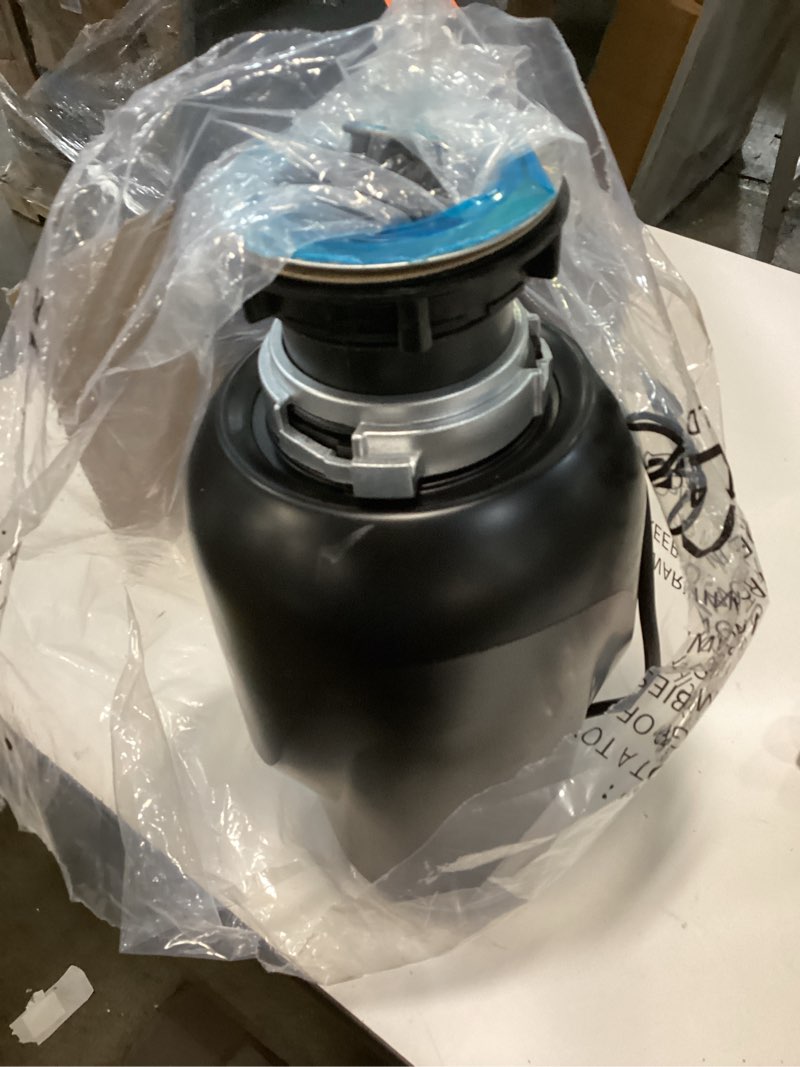 Condition photo showing Good Condition for KRAUS WasteGuard 3/4 HP Ultra-Quiet Garbage Disposal with Quick Connect, Kitchen Sink Drain Cover, Power Cord and Flange Included, KWD100-75MBL Quick-connect, Plug-In 3/4 HP