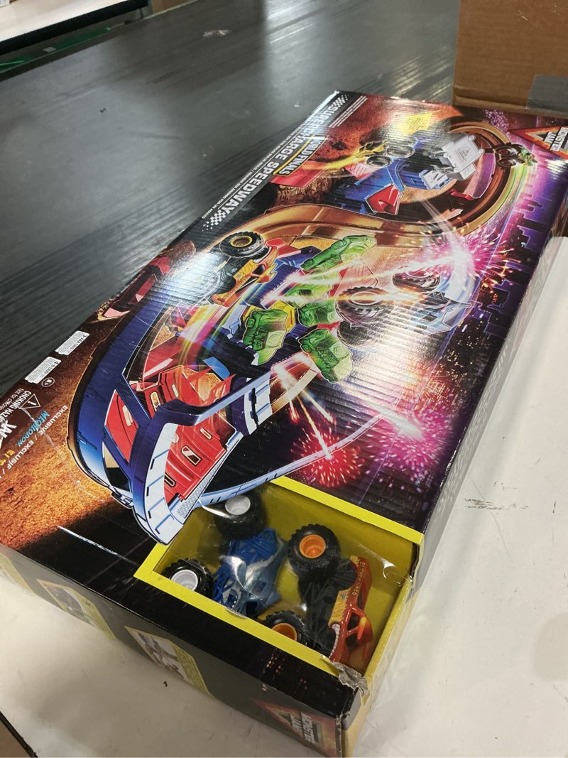 Condition photo showing Good Condition for monster jam, supercharge speedway playset, megalodon and el toro loco die-cast monster trucks, light up world finals track kids toys for boys ages 3 and up