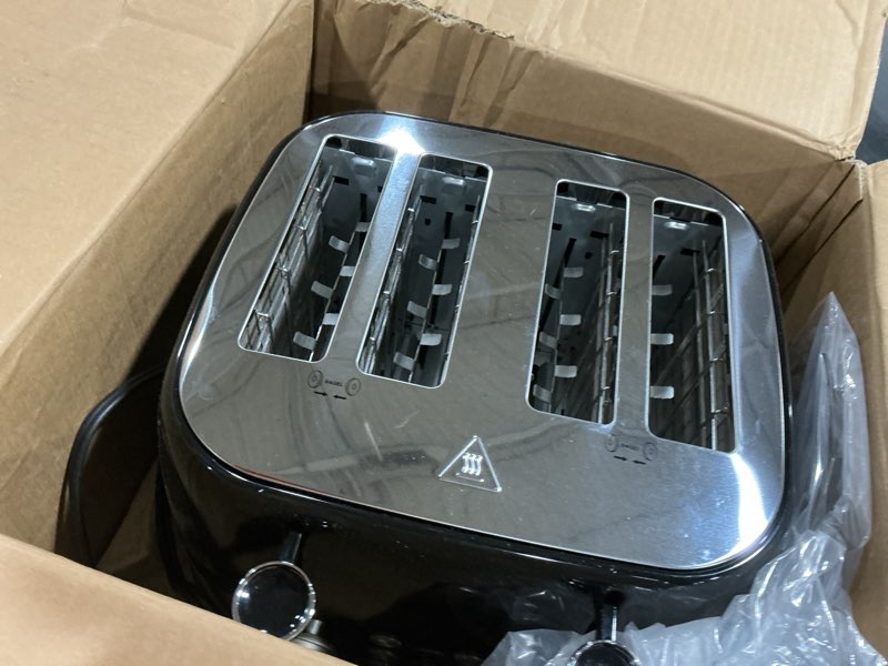 Condition photo showing As Is for Amazon Basics 4 Slice Toaster, 6 Browning Settings, Removable Crumb Tray, Bagel and Defrost Function, Cancel Button, 1600W, Black Black 4 Slice Toaster