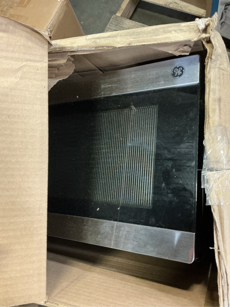 Condition photo showing As Is for GE GCST10A1WSS 1.0 Cu Ft Convection Microwave Oven, 1050W Countertop Air Fry Microwave with Broil & Crisper Pan, Compact Stainless Steel Design