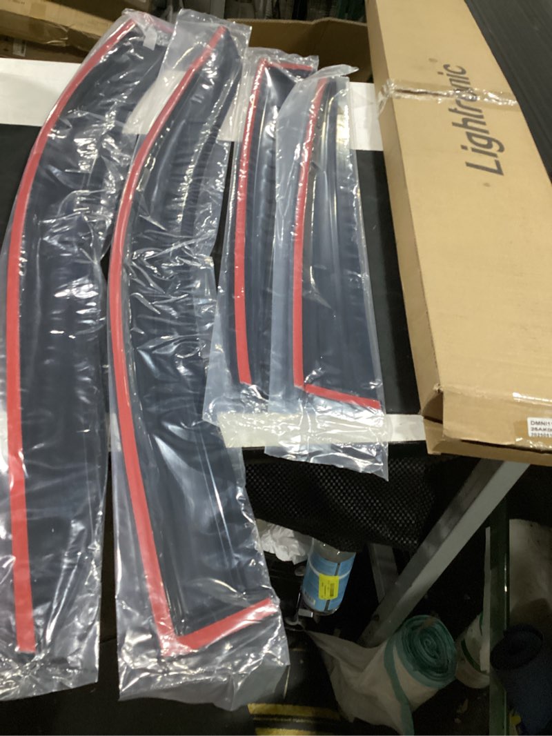 Condition photo showing As Is for lightronic extra durable window visor