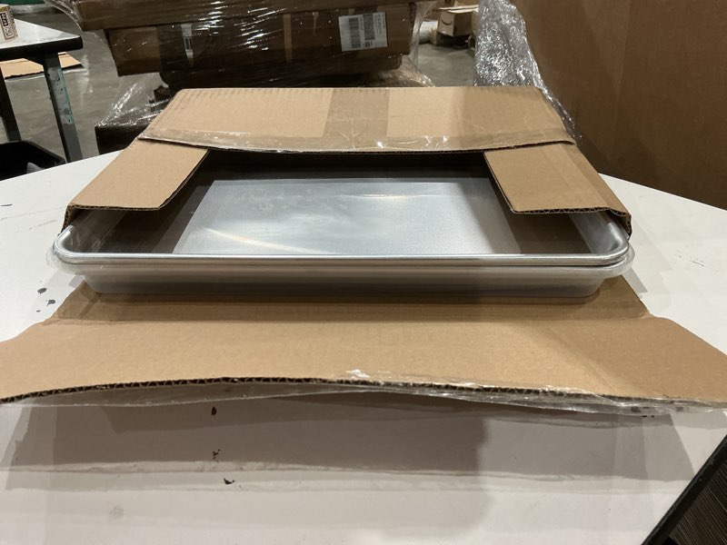 Condition photo showing As Is for nordic ware naturals half sheet set - usa made aluminum commercial quality sheet pan for baking or roasting, encapsulated galvanized steel rim prevents warping, 2pk half + lid