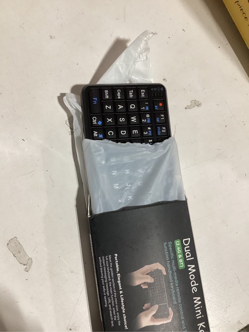 Condition photo showing Good Condition for Mini Keyboard with Touchpad, Mini Bluetooth Keyboard, 2.4G Ultra-Thin Handheld Wireless Portable, Suitable for PC/Tablet/TV/Smartphone, Suitable for Travel, Office and Home Use?Rechargeable