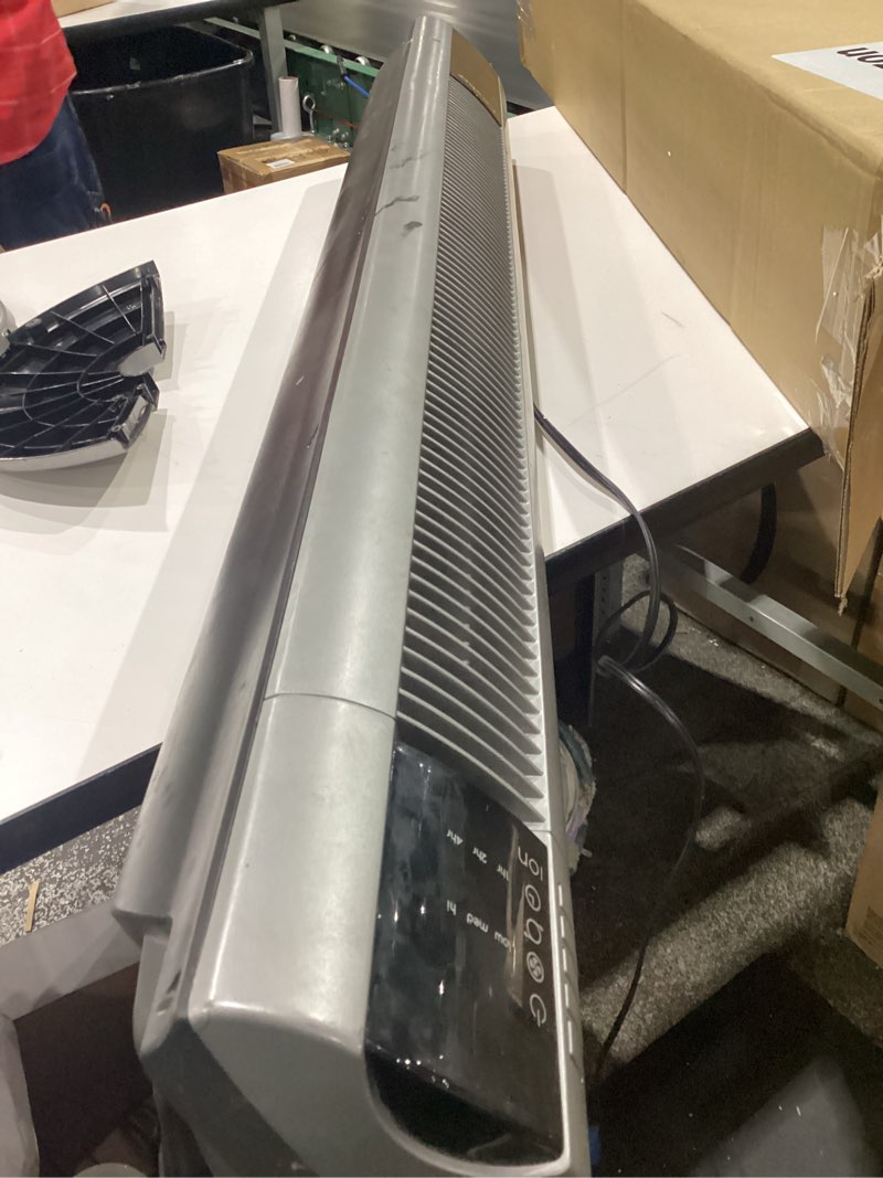 Condition photo showing As Is for used lasko tower fan, oscillating performance, remote control, nighttime setting, timer, 3 speeds, high-velocity tower fan, room fan for bedroom or office, 48\" gray, t48314