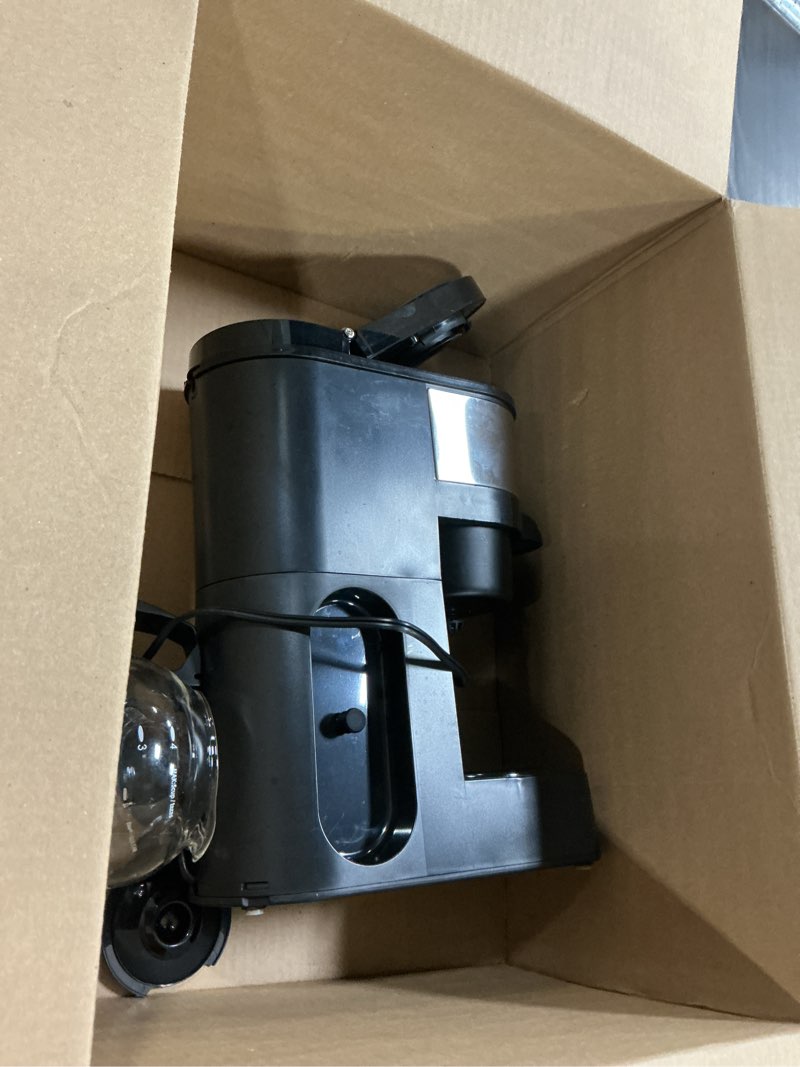Condition photo showing As Is for grind and brew coffee maker,drip coffee maker with grinder built in,5-cup programmable coffee machine with brew strength,warming plate and multiple grind levels for home & office