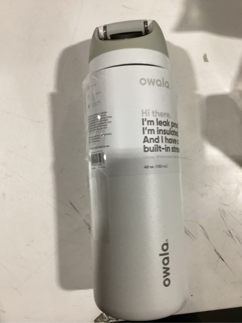 Condition photo showing Good Condition for Owala FreeSip Insulated Stainless Steel Water Bottle with Straw, BPA-Free Sports Water Bottle, Great for Travel, 40 Oz, Shy Marshmallow Shy Marshmallow 40 Ounces