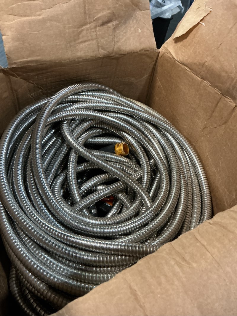 Condition photo showing As Is for vevor garden hose metal 150 ft, rust proof stainless steel water hose, heavy duty backyard hose with 10 function nozzle, no-kink & flexible water pipe, lightweight metal hose for yard, outdoor 150 ft with 10 function spray nozzle