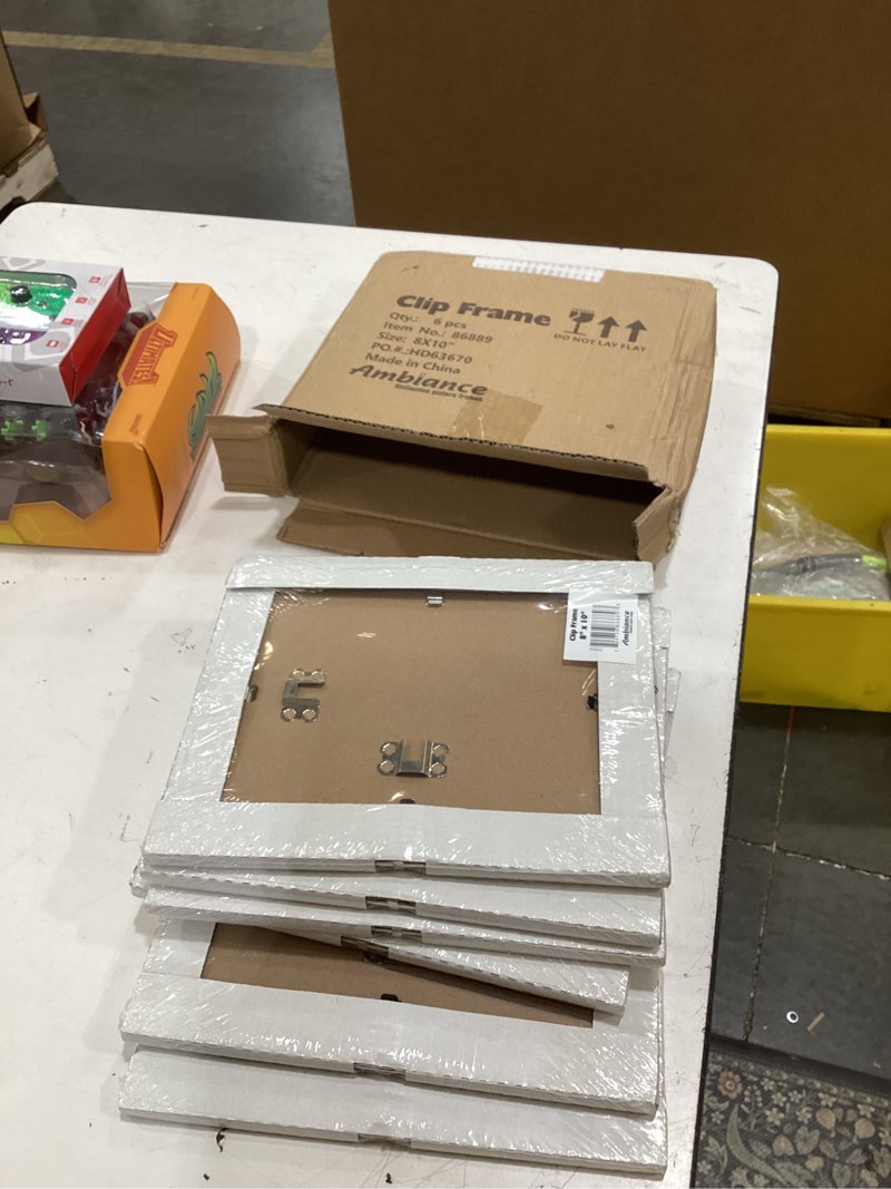 Condition photo showing New/Like New for ambiance gallery clip frame - 8x10-6 pack of modern low-profile invisible minimalist picture frames - poster frames with glass and backing