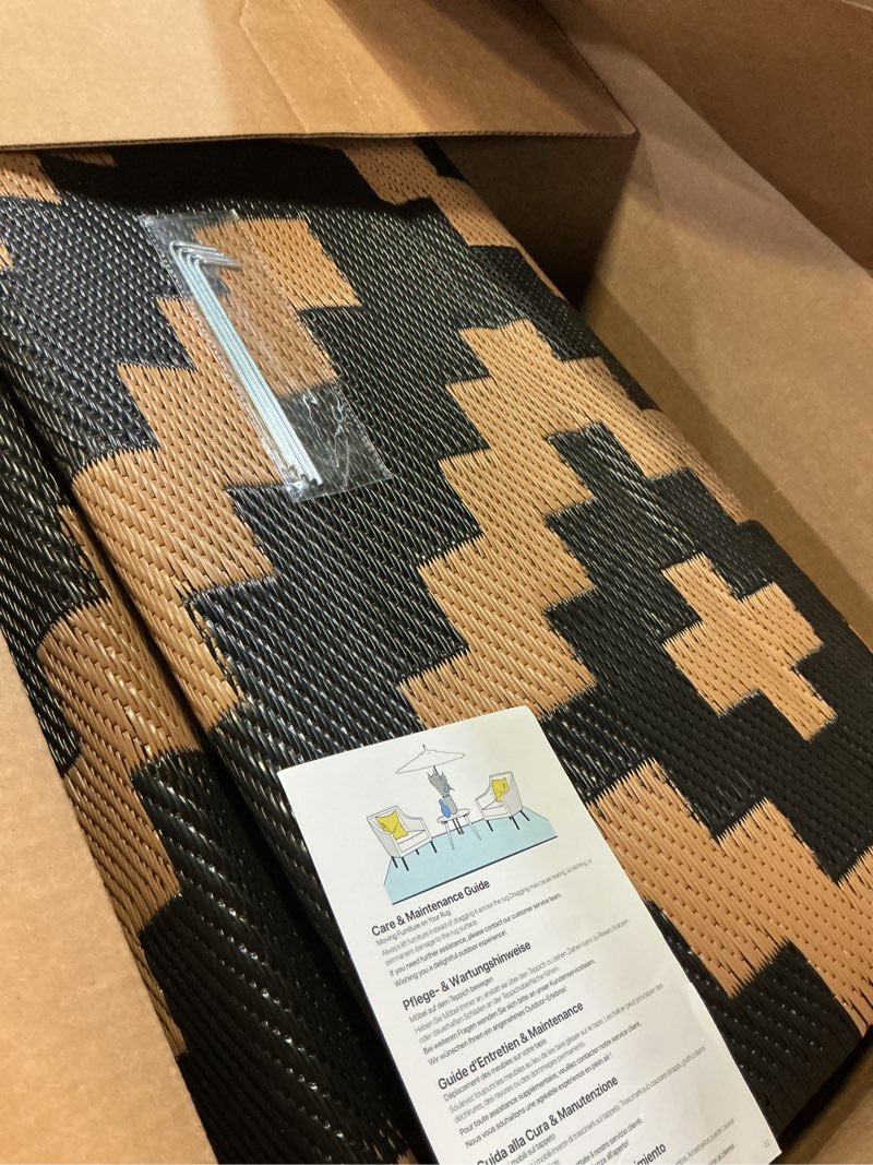 Condition photo showing Good Condition for sand mine waterproof outdoor rug 4x6 ft, plastic straw area rug, large floor mat for outdoors, rv, patio, backyard, deck, picnic, beach, trailer, camping, black & brown lattice