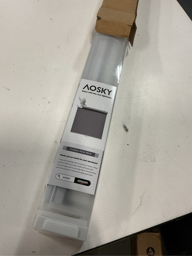 Condition photo showing Good Condition for AOSKY Cordless Roller Shades Blackout Blinds for Windows Room Darkening Rolled Up Shades with Spring System, UV Protection Window Shades Door Blinds for Home and Office (31.5" W x 72" H, White) 31.5"W x 72"H White