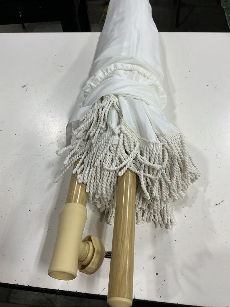 Condition photo showing As Is for 6.5ft patio umbrella with fringe, beach umbrella, fringe umbrella outdoor patio with hanging hook, tilting aluminum pole, uv 50+, fiberglass ribs, elegant cream