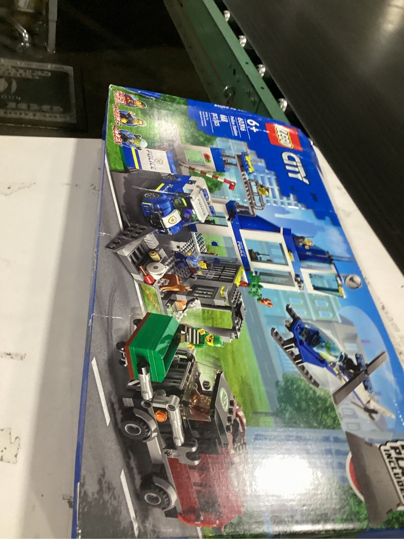 Condition photo showing New/Like New for lego city police station with van, garbage truck & helicopter toy 60316, gifts for 6 plus year old kids, boys & girls with 5 minifigures and dog toy standard packaging