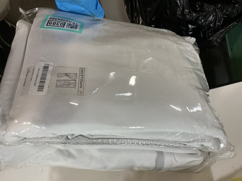 Condition photo showing As Is for nicetown dust isolate sound barrier 100% blackout rod pocket curtains 84" long, non-oily particle, noise, cold & cold blocking drapes multiple protection for nursery/daytime sleep (white, 2 pcs) dust filter | back tab | pure white 52"w x 84"l (pack of 2)
