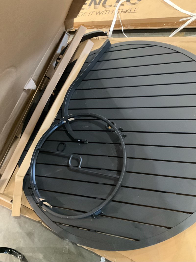 Condition photo showing As Is for style selections pelham bay round outdoor dining table 48-in w x 48-in l with umbrella hole