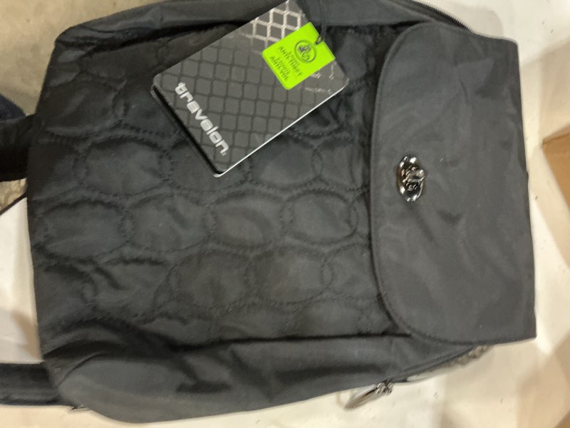 Condition photo showing Good Condition for travelon anti-theft runways compact backpack 11”w x 12.5”h x 3”d black