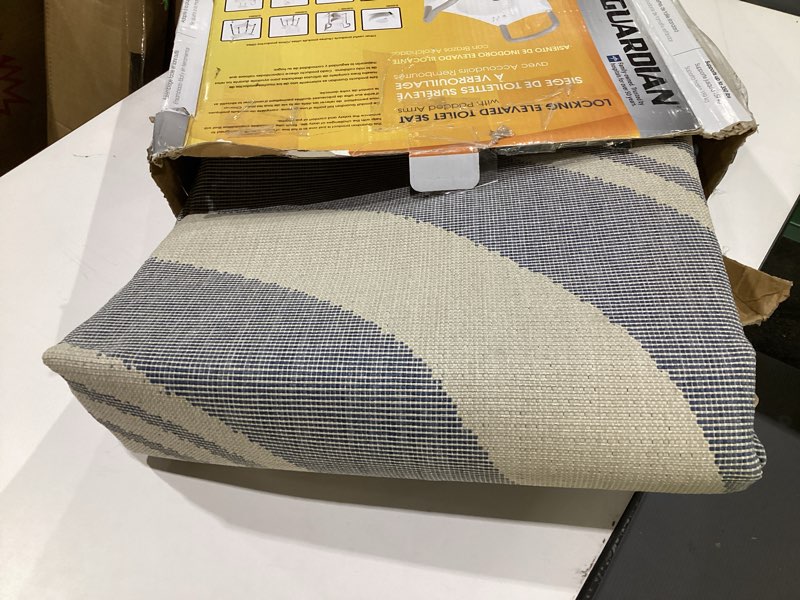 Condition photo showing As Is for nuLOOM Oval 5' x 8' Outdoor Performance Area Rug, OEKO-TEX Certified, Weather Resistant, High Traffic, Patio, Balcony, Outside, Robin Blue