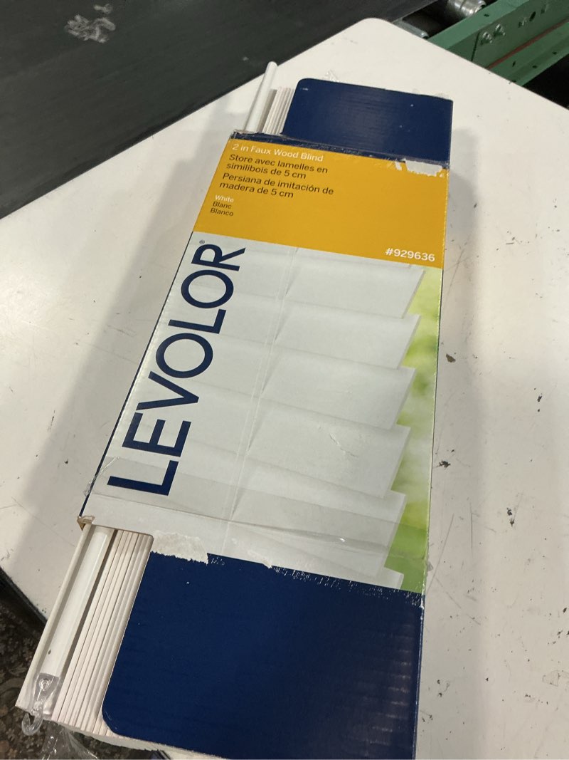 Condition photo showing As Is for levolor trim+go 2-in slat width 23-in x 64-in cordless white faux wood room darkening horizontal blinds
