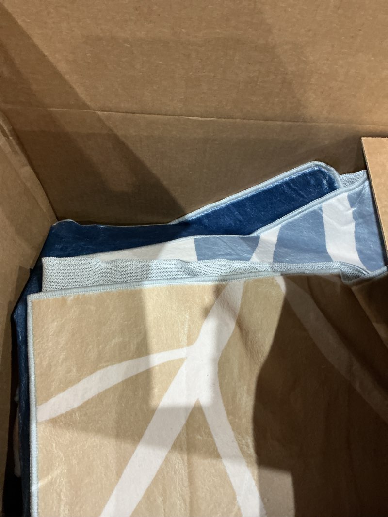 Condition photo showing As Is for Lahome Washable Area Rug - 8x10 Non-Slip Ultra-Thin Large Area Rug, Soft Bedroom & Living Room Rug, Boho Botanical Print Indoor Stain Resistant Floor Rug for Dining Room Table & Office 8' x 10' Denim/Sepia