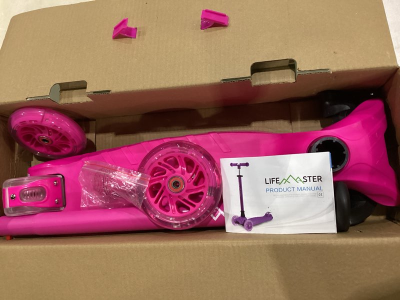 Condition photo showing Good Condition for lifemaster mini 3-wheel kids scooter with multi-color wheel lights – 4-height adjustable handlebar, wide anti-slip deck, child safety certified, boys & girls ages 2+ supports up to 110 lbs pink children and toddler