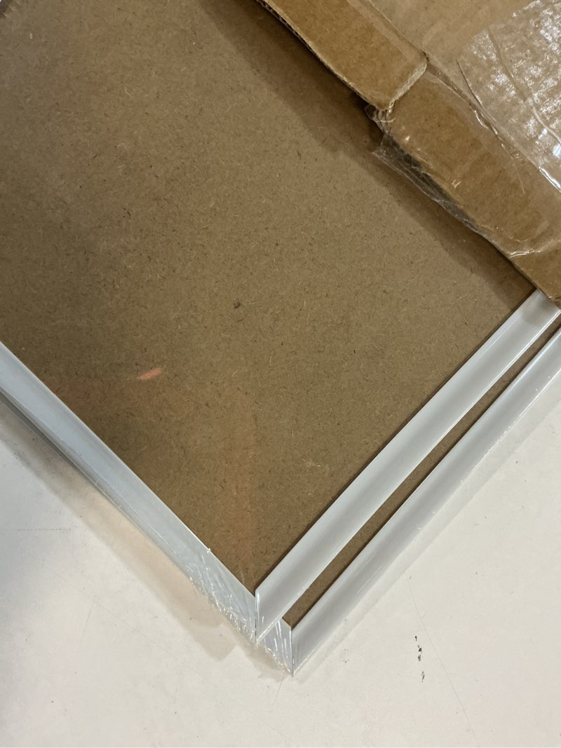 Condition photo showing As Is for upsimples 18x24 Picture Frame White 3 Pack, Scratch-Proof Poster Frames 18 x 24 for Photo Gallery - Slide-In Strips, Horizontal or Vertical Wall Mounting White 18x24
