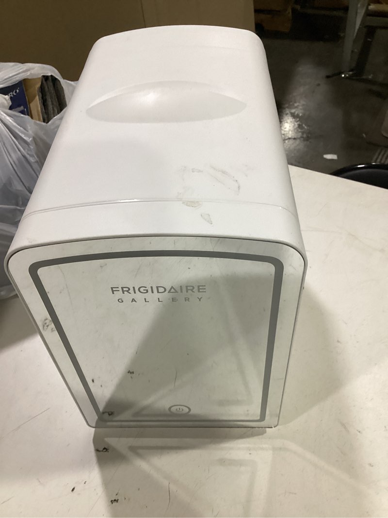 Condition photo showing As Is for frigidaire gallery 6.5l, 9 can lighted beauty mirror mini fridge, personal cooler in white