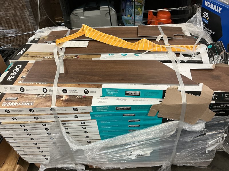 Condition photo showing As Is for pergo duracraft montcrest brown 22-mil x 7-1/2-in w x 47-in l waterproof interlocking luxury vinyl plank flooring (17.32-sq ft/ carton)