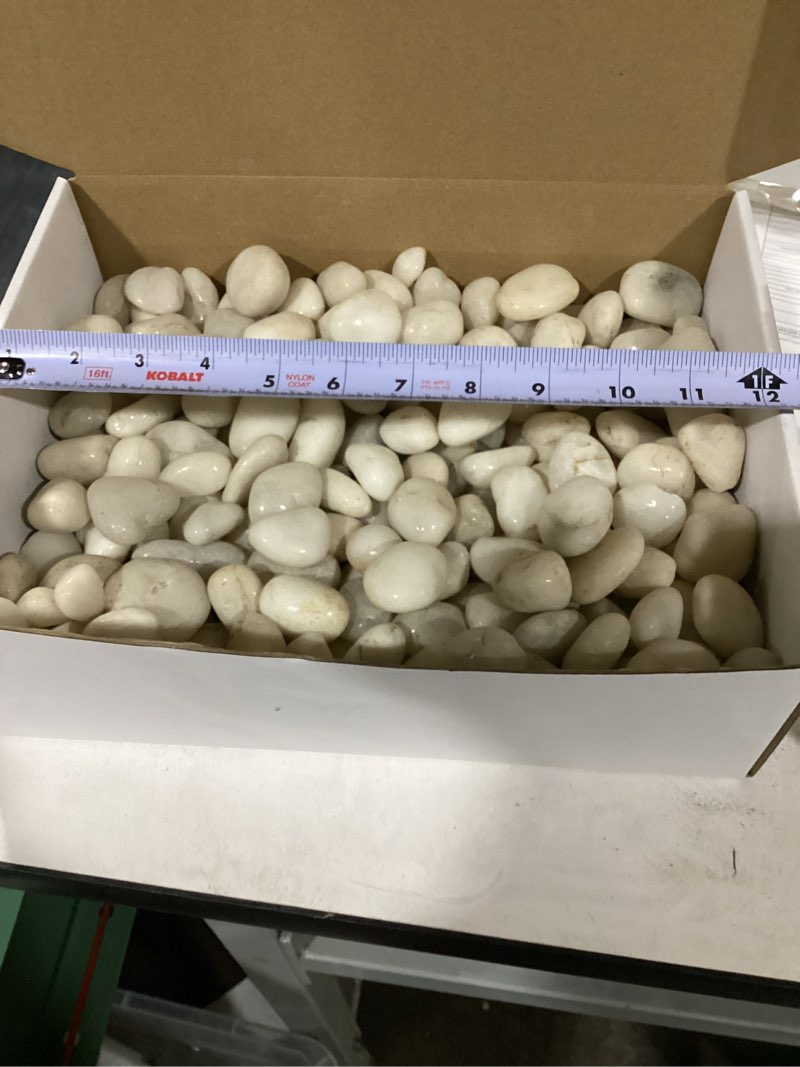 Condition photo showing As Is for  small box of landscaping rocks for planters, decoration, drainage
