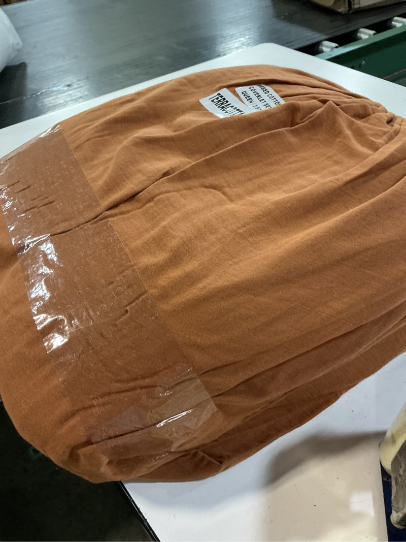 Condition photo showing New/Like New for organic ribbed cotton coverlet set color terracota(size queen)