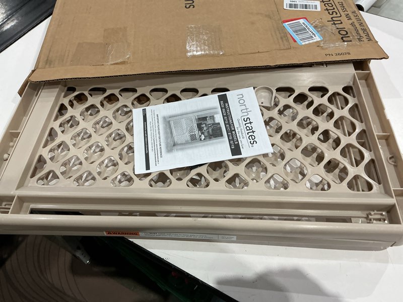 Condition photo showing As Is for toddleroo by north states - supergate ergo baby gate: plastic baby gate for stairs & doorways - adjustable indoor safety gate - made in usa - 26 to 42 inches wide - 26 inches tall - sand