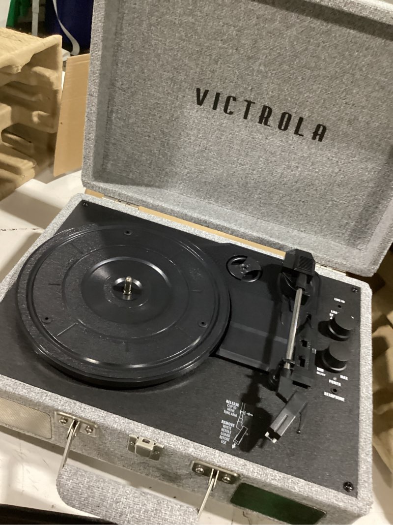Condition photo showing Good Condition for victrola journey bluetooth portable suitcase record player – with built-in speakers, 3 speed vinyl record player, rca out, headphone jack (light grey)