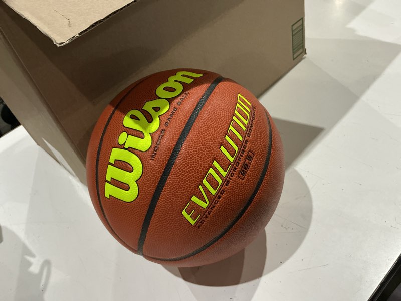Condition photo showing As Is for wilson evolution indoor game basketballs - size 5, size 6 and size 7 yellow/brown size 6 - 28.5"