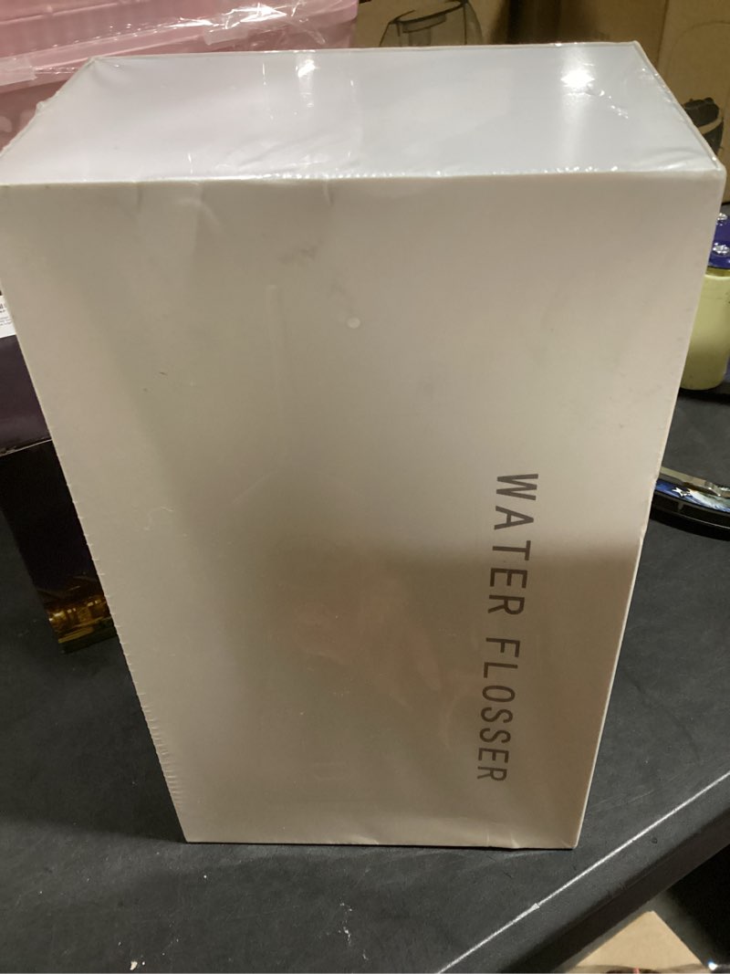 Condition photo showing New/Like New for Water Dental Flosser for Teeth, Portable Cordless Water Flosser with 300ML Rechargeable with Type-C, IPX7 Waterproof Water Flossers for Adults with 3 Intensity Modes and 3 Flossing Tips Bordeaux