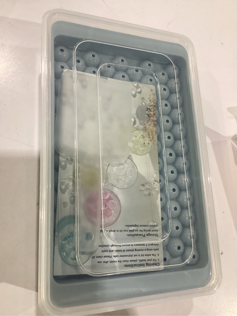 Condition photo showing New/Like New for wibimen mini ice cube trays, 0.55” tiny pebble ice for iced coffee & cocktails, fast chill, easy twist release, stackable with lid & storage bin (2 pack, blue) 2pack/0.55in blue