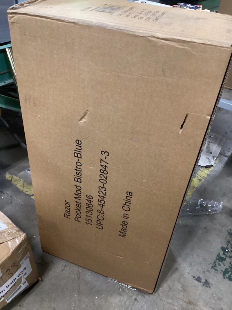 Condition photo showing New/Like New for Razor Pocket Mod Electric Scooter Ride-On for Kids Ages 8+, 170 lb Max Weight – 250W Motor, Up to 15 Mph, 40-Min Run Time on High Speed, Twist-Grip Throttle, 12” Pneumatic Tires, Under Seat Storage Blu