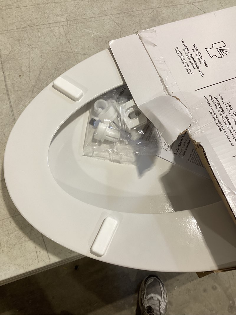 Condition photo showing As Is for american standard moments wood white elongated soft close toilet seat