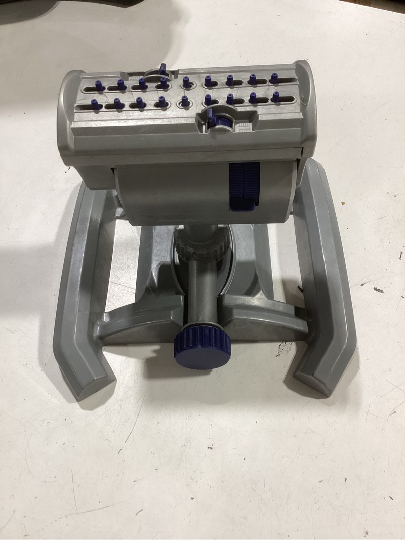 Condition photo showing As Is for orbit oscillating sprinkler