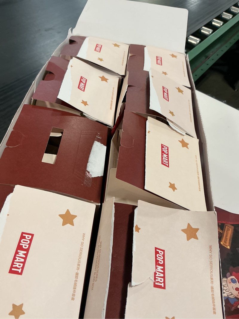 Condition photo showing As Is for pop mart why so serious series vinyl plush doll pendant 8-pack