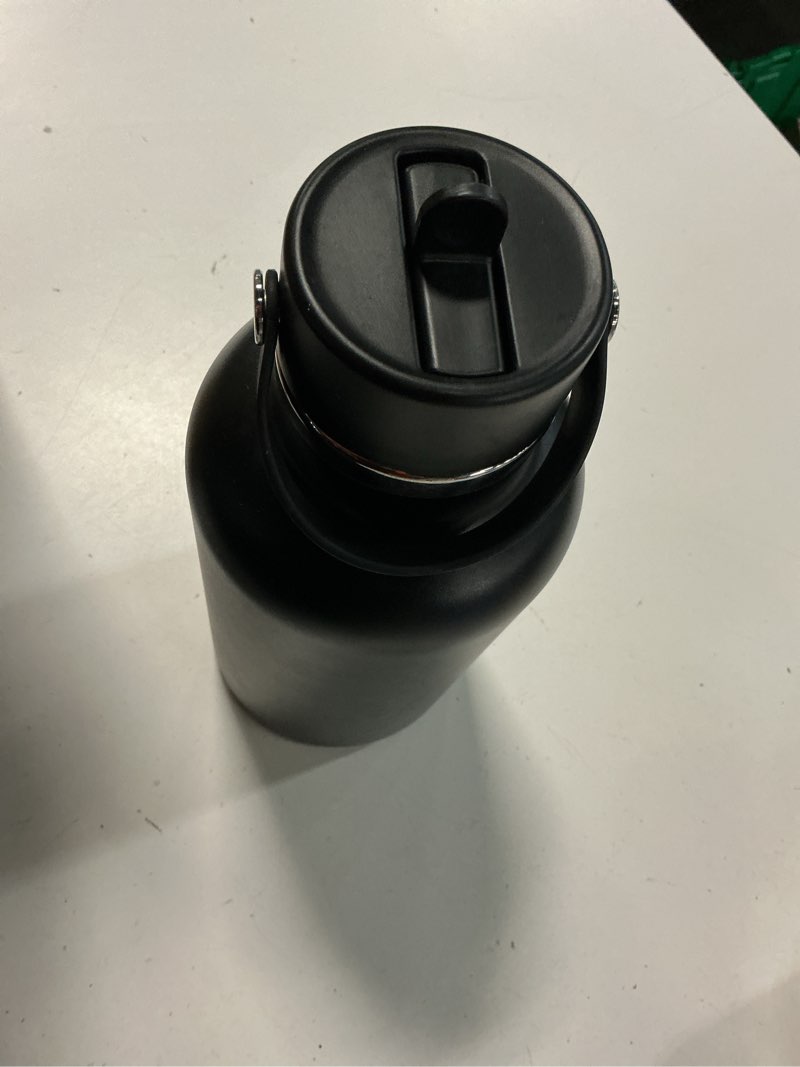 Condition photo showing Good Condition for hydro flask water bottle - insulated stainless steel - wide straw lid, non spill, leakproof in 64 oz tonal black