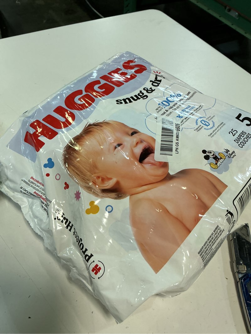 Condition photo showing New/Like New for huggies snug & dry disposable diapers - size 5 - 25ct