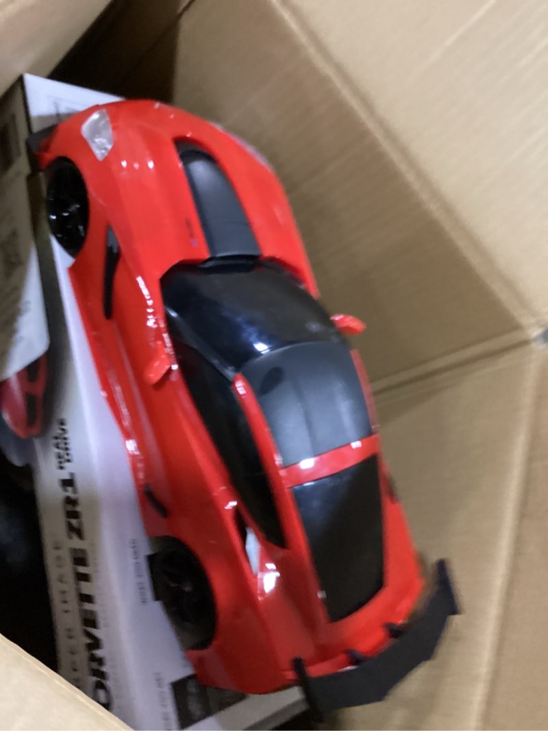 Condition photo showing As Is for sharper image rc real drive chevrolet corvette zr1 - 1:16 scale