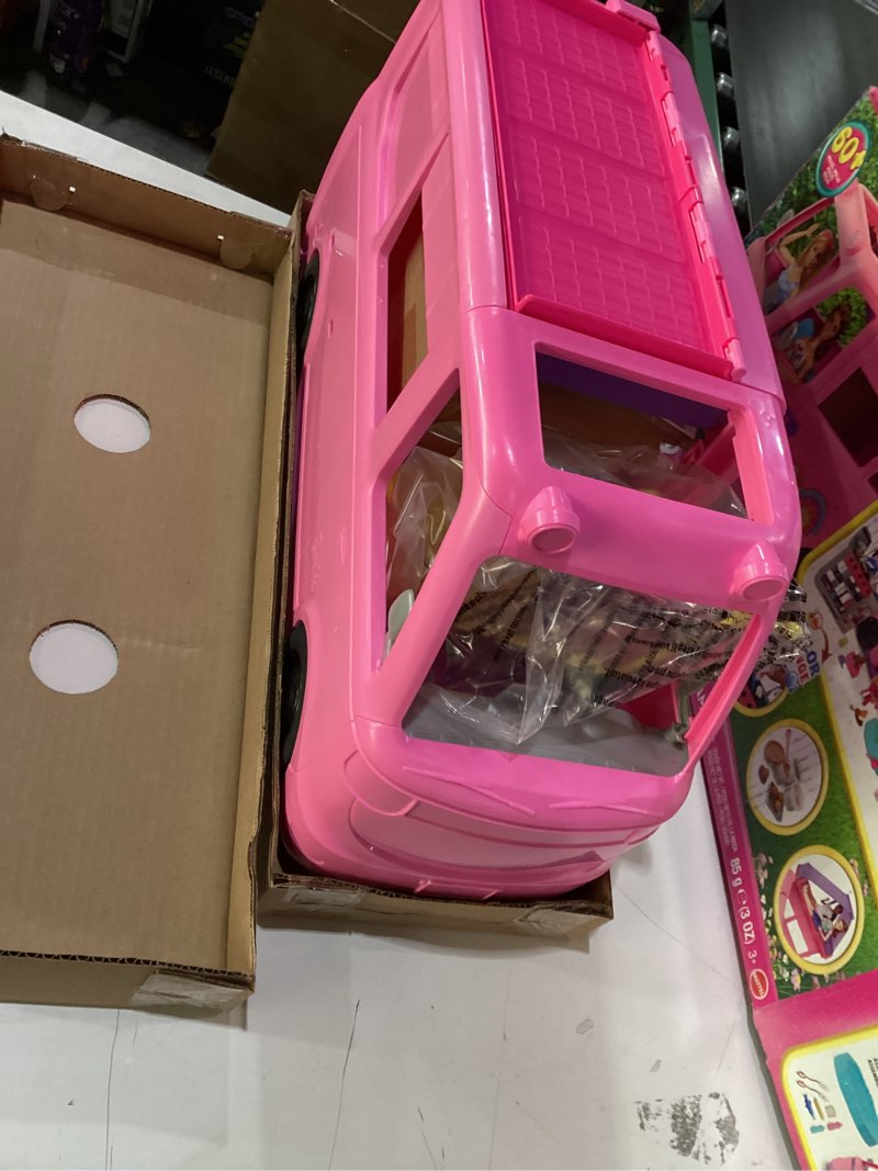 Condition photo showing As Is for Barbie Dream Camper New for 2025 Playset with Roof Tent, Swing Chair, Fishing Pond, BBQ Grill with Color-Change Feature & 60+ Accessories Including Dough