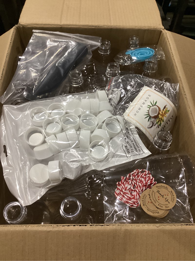 Condition photo showing New/Like New for Baderke 24 Set Plastic Coquito Bottles 32 oz Plastic Clear Wine Bottles with Caps and Tags for Home Brewing Wedding Party Favors(Black)