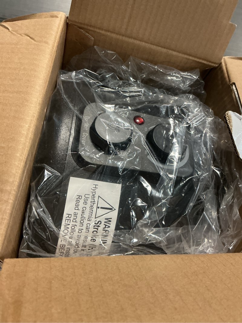 Condition photo showing As Is for   Utilitech Up to 1500-Watt Fan Utility Indoor Electric Space Heater