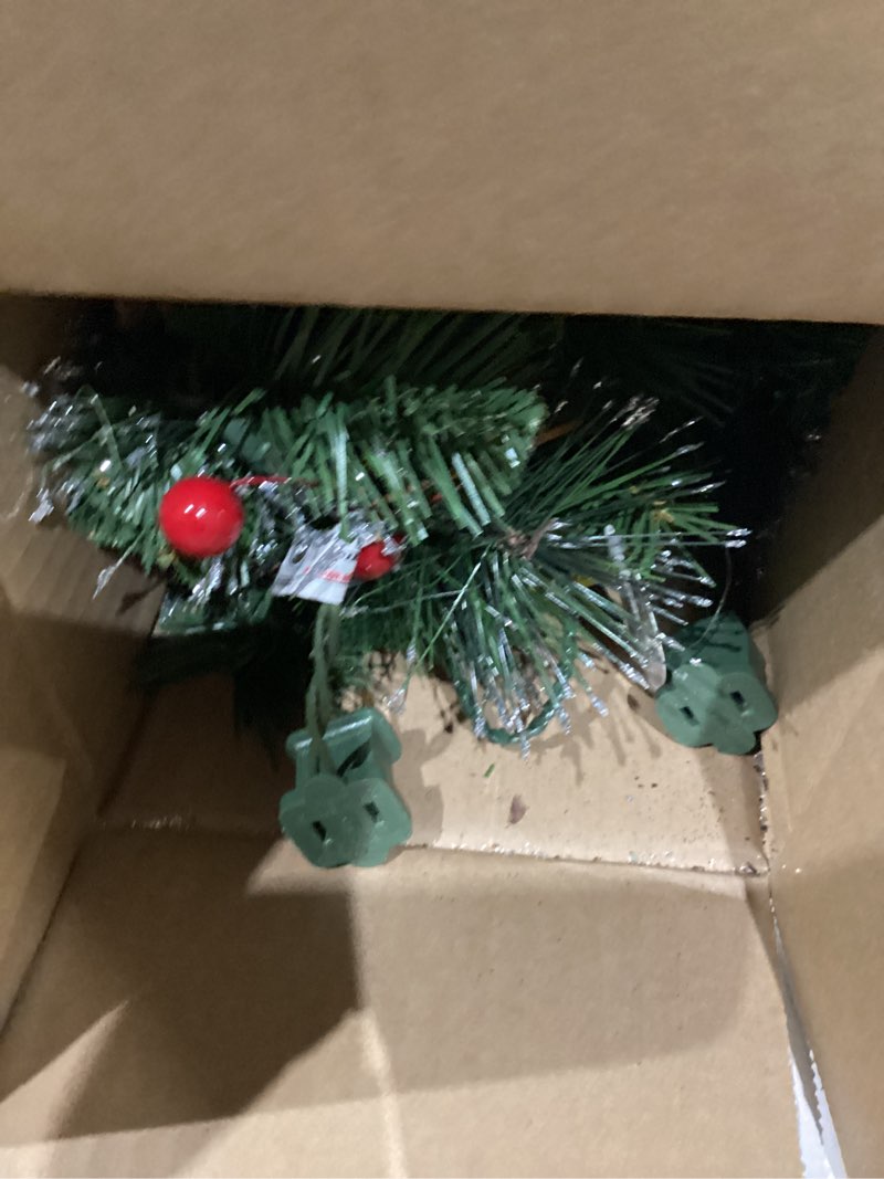 Condition photo showing Good Condition for national tree company 9 ft pre-lit crestwood spruce artificial christmas garland, christmas decoration with glitter, pinecones, red berries, 50 clear lights, 180 tips, green plug in tree