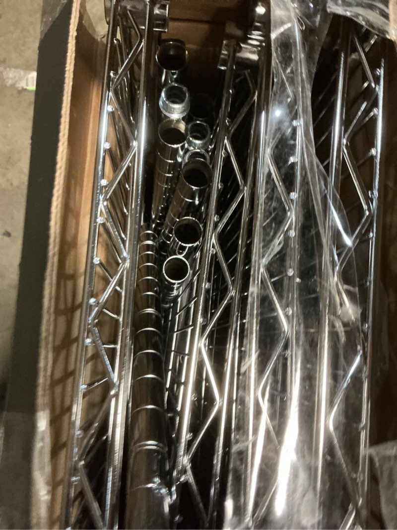 Condition photo showing As Is for 4 tier wire shelving chrome - brightroom™