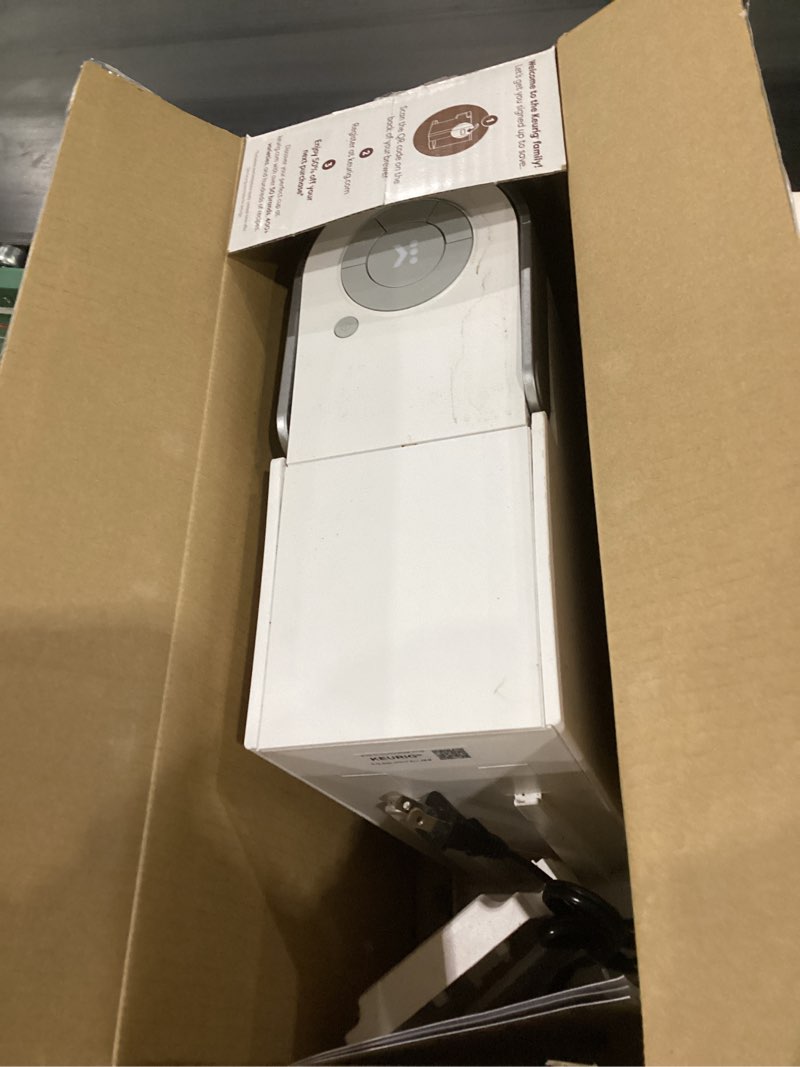 Condition photo showing As Is for not tested used damage keurig k-slim single serve k-cup pod coffee maker, multistream technology, 3 brew sizes, slim and sleek design, 46oz removable reservoir, white