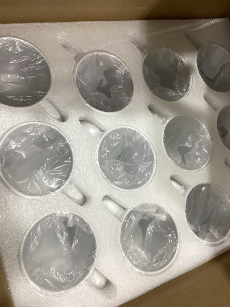 Condition photo showing New/Like New for DANALLAN Sublimation Mugs, Premium Coffee Mugs Set of 12 White Ceramic Sublimation Cups 11 oz Christmas Coffee Mug for Soup Tea Milk Latte Hot Chocolate