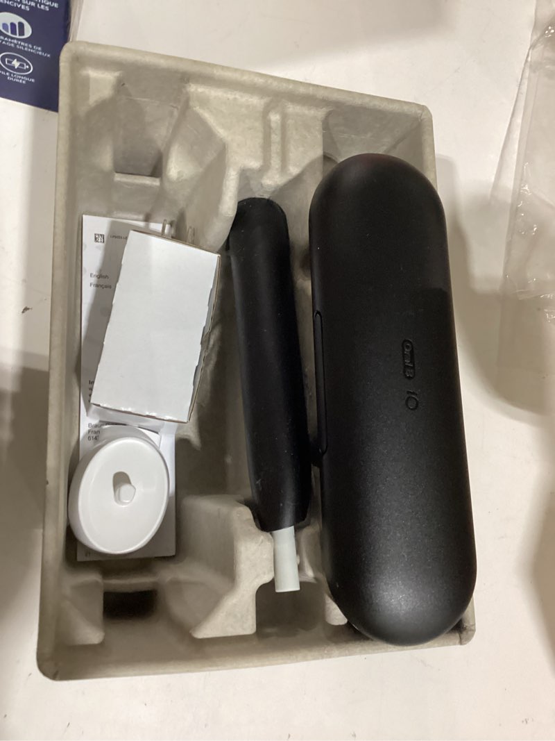 Condition photo showing As Is for oral-b io simple clean rechargeable electric powered toothbrush, night black with 1 gentle care brush head and 1 black travel case - automatic pressure sensor to protect gums - 3 modes - 2 min timer night black 1 count (pack of 1)